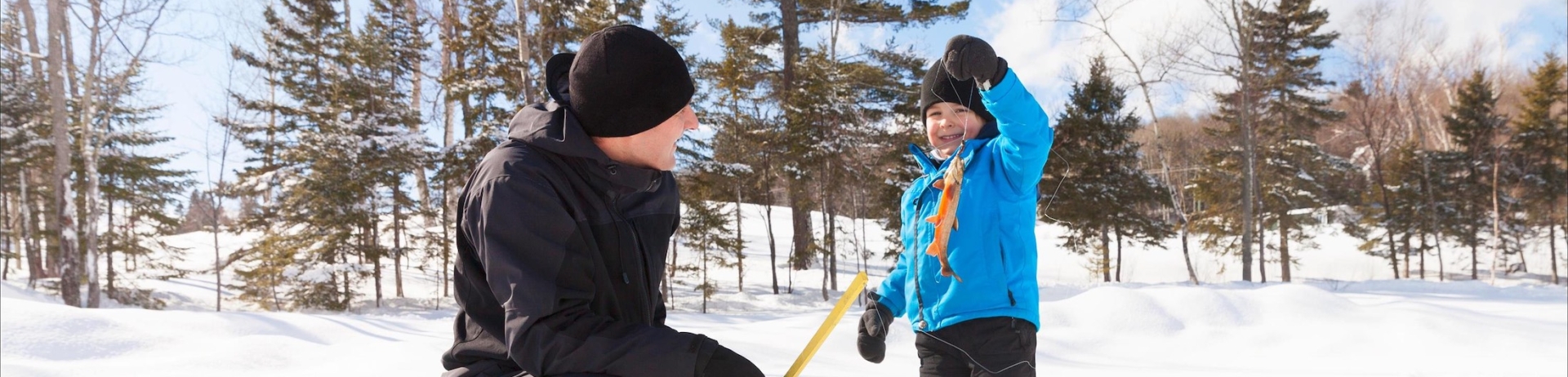 father and son ice fishing