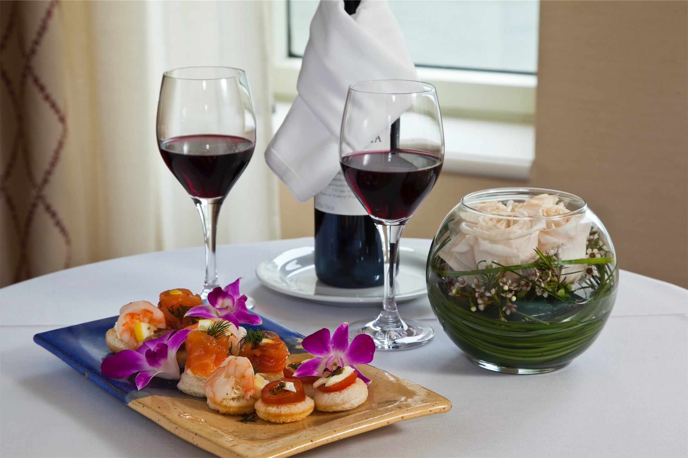 table with wine and appetizers
