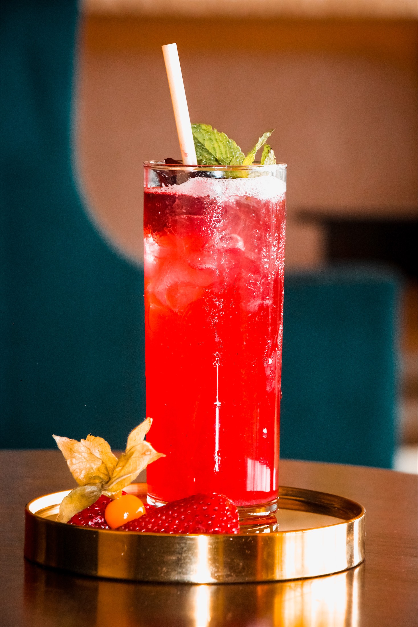 cocktail with strawberry garnish
