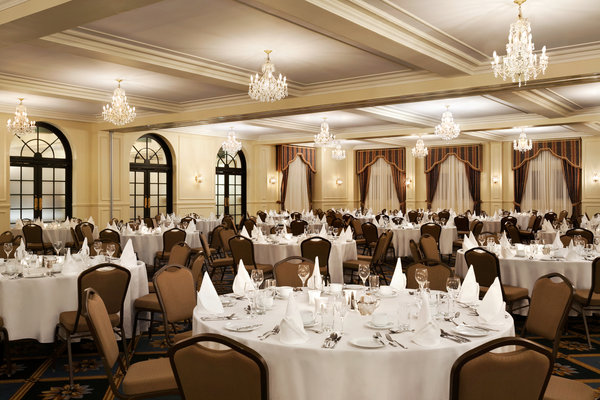 room with round tables set up for a reception