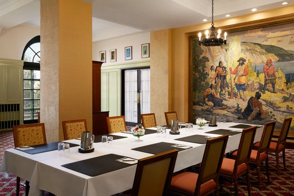 room with table set up for a meeting