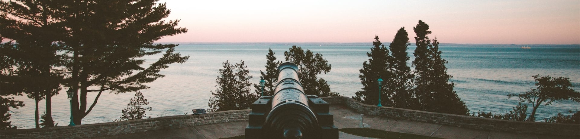 canon looking out over the water