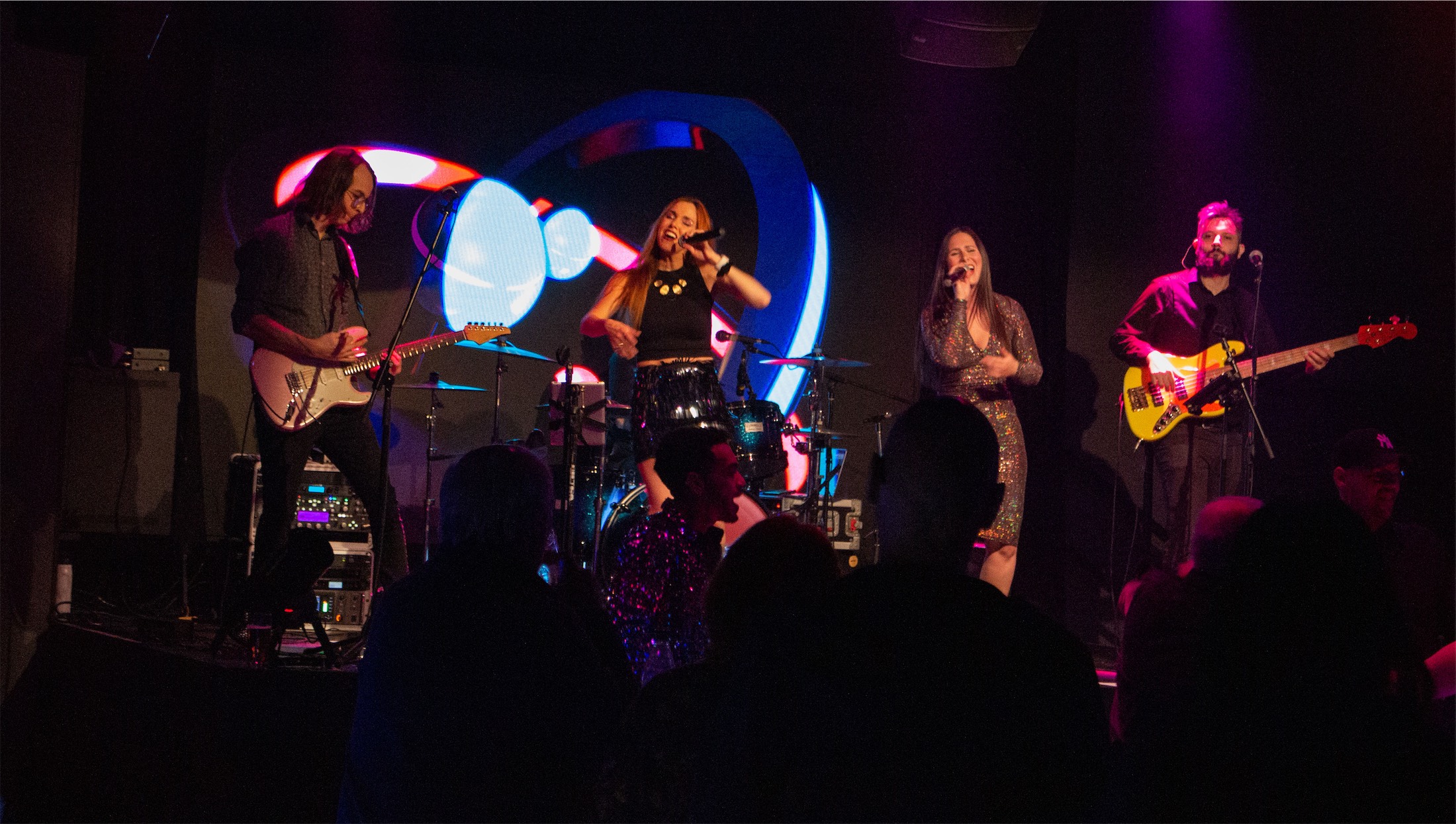people singing on stage