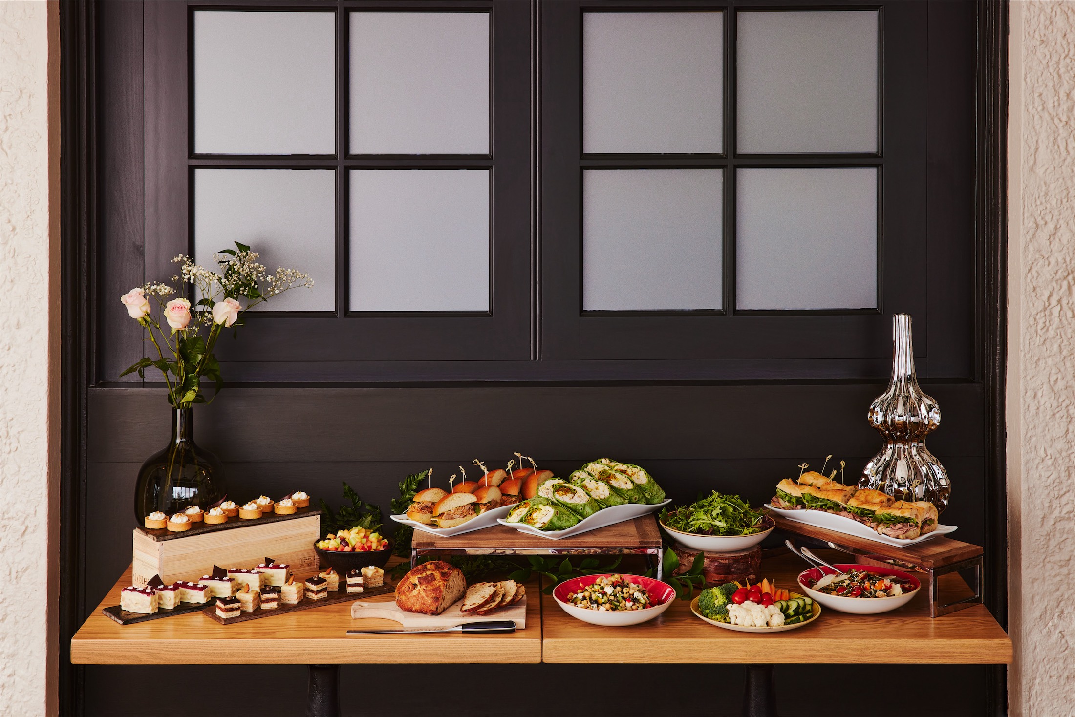 table display of lunch and desserts