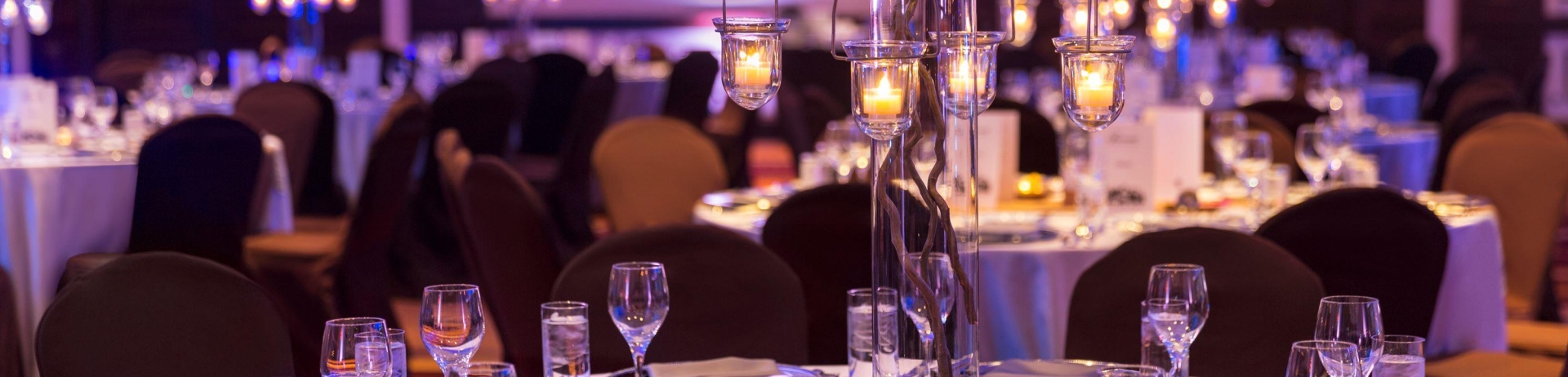 close up of table settings in reception hall