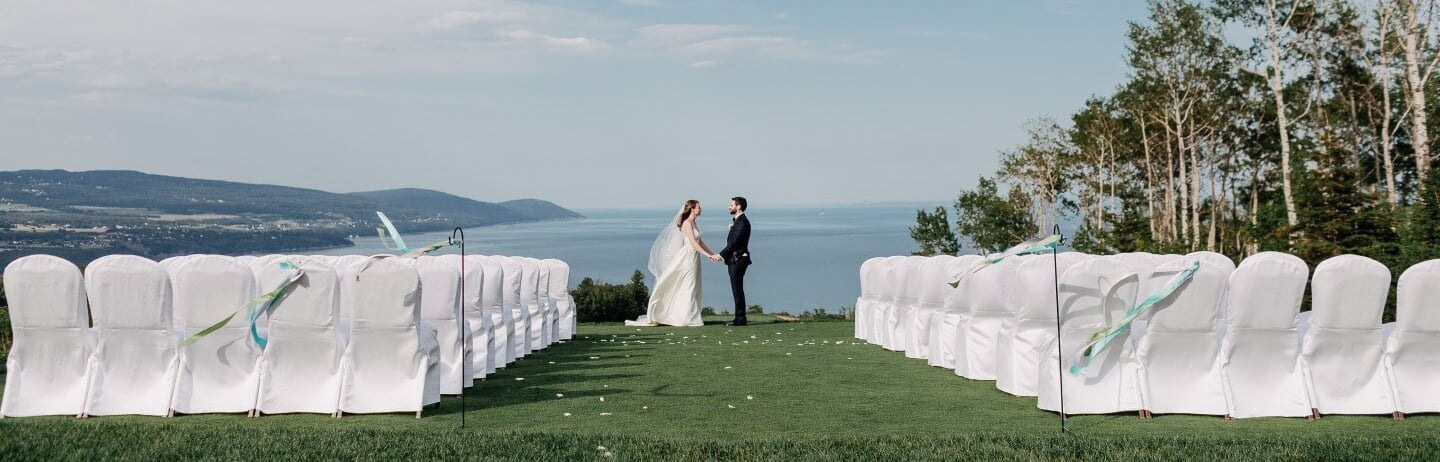 bride and groom holding hands