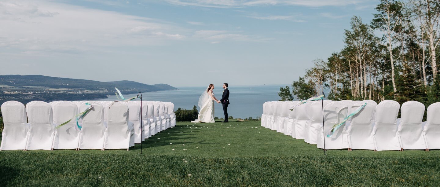 bride and groom holding hands
