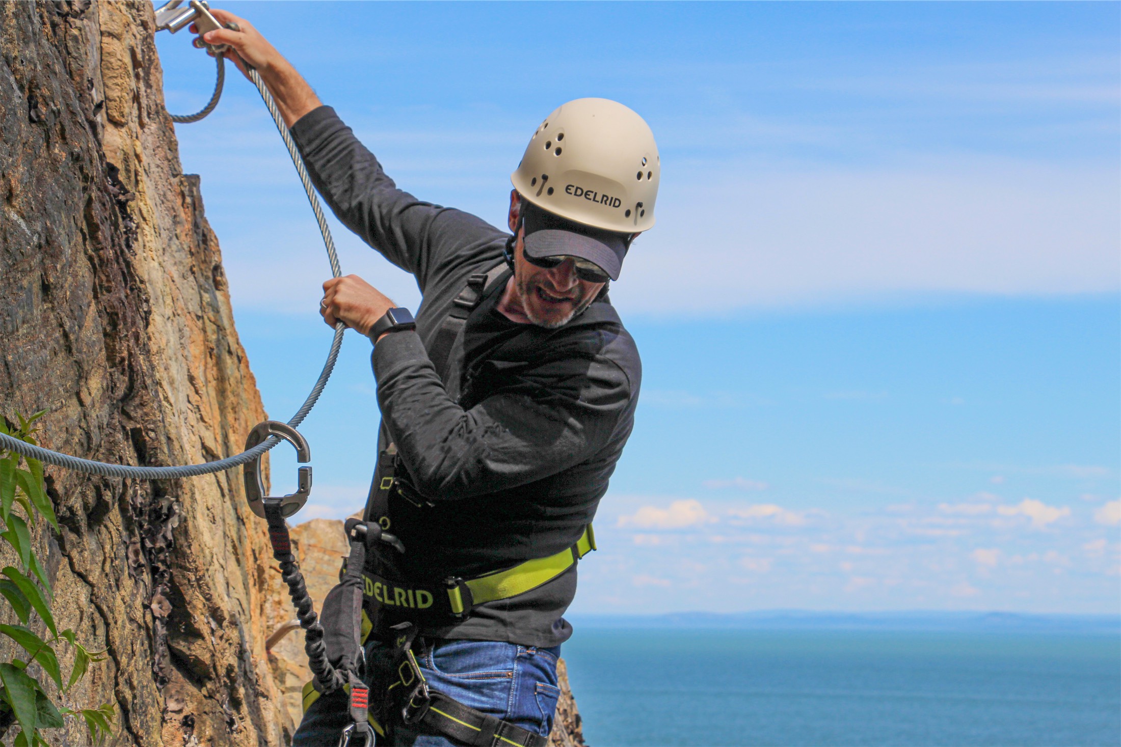 man rock climbing